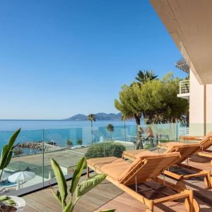 Day room with balcony views at Canopy By Hilton Cannes.