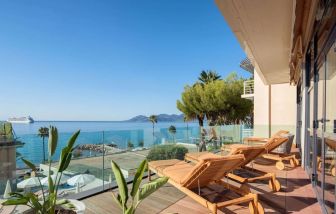 Day room with balcony views at Canopy By Hilton Cannes.