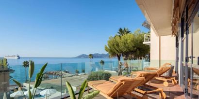 Day room with balcony views at Canopy By Hilton Cannes.