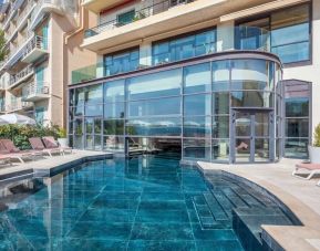 Outdoor pool at Canopy By Hilton Cannes.