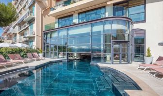 Outdoor pool at Canopy By Hilton Cannes.