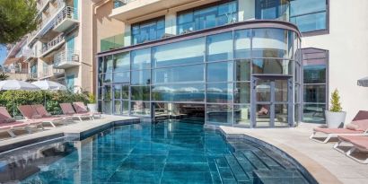 Outdoor pool at Canopy By Hilton Cannes.