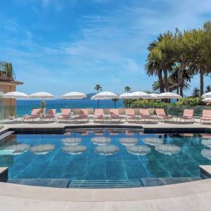 Outdoor pool area at Canopy By Hilton Cannes.