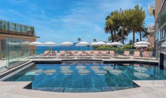 Outdoor pool area at Canopy By Hilton Cannes.