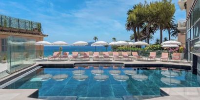 Outdoor pool area at Canopy By Hilton Cannes.