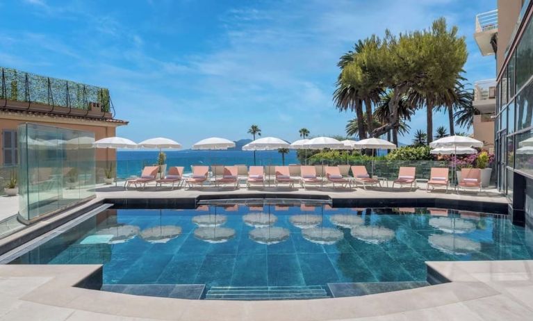 Outdoor pool area at Canopy By Hilton Cannes.