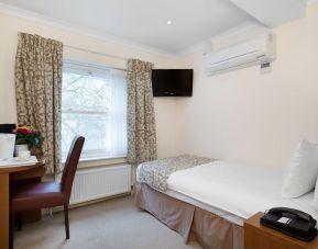 Day use single room with work desk at The Bayswater Inn Hotel.