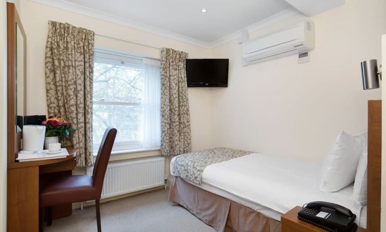 Day use single room with work desk at The Bayswater Inn Hotel.