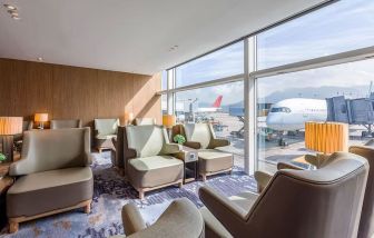 Ample seats with natural light perfect for coworking at Plaza Premium Lounge, Near Gate 60 - Terminal 1 (HKG).