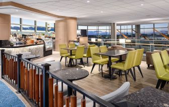 Dining area perfect for coworking at Plaza Premium Lounge, Domestic Gate C29 (YVR).