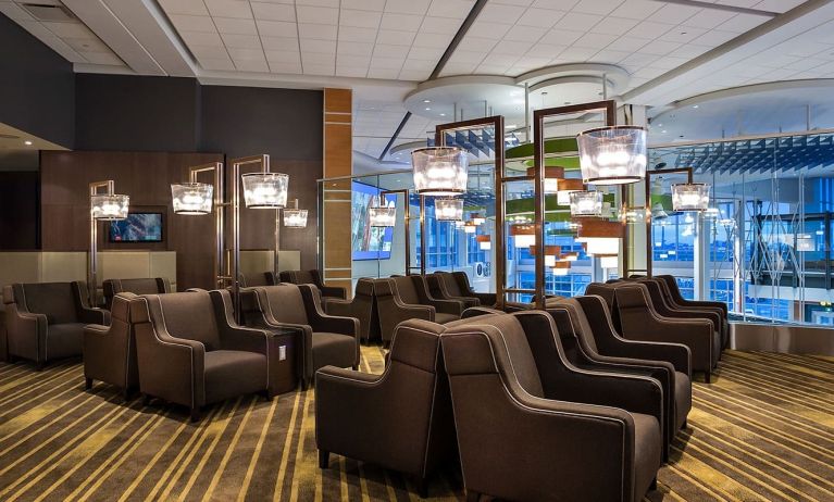 Comfortable lounge seating at Plaza Premium Lounge, Domestic Gate B15 (YVR).