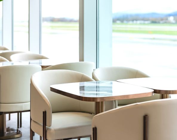 Ample seats with natural light perfect for coworking at Plaza Premium Lounge (YVR).