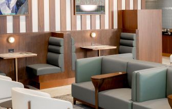 Ample seats with natural light perfect for coworking at Plaza Premium Lounge (YVR).