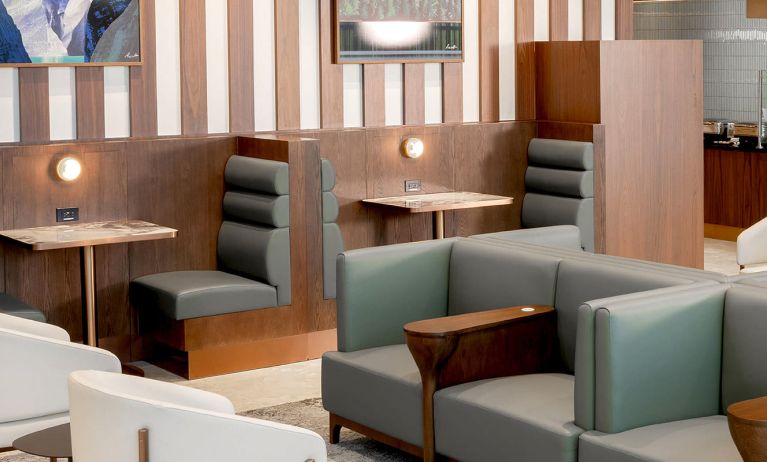 Ample seats with natural light perfect for coworking at Plaza Premium Lounge (YVR).