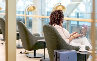 Ample seats with natural light perfect for coworking at Plaza Premium Lounge (YVR).