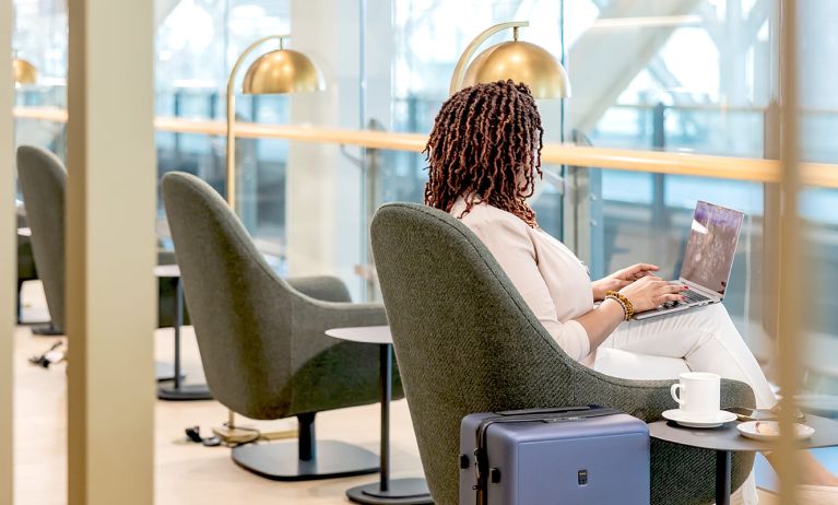 Ample seats with natural light perfect for coworking at Plaza Premium Lounge (YVR).