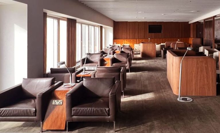 Ample seats with natural light perfect for coworking at Blush Lounge By Plaza Premium Group, Departures (LHR).