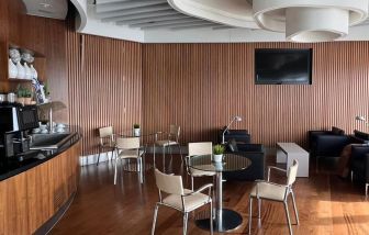 Dining area perfect for coworking at Blush Lounge By Plaza Premium Group, Departures (LHR).