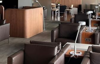 Ample seats with natural light perfect for coworking at Blush Lounge By Plaza Premium Group, Departures (LHR).