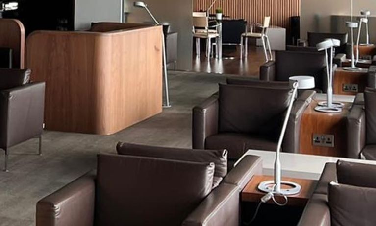 Ample seats with natural light perfect for coworking at Blush Lounge By Plaza Premium Group, Departures (LHR).