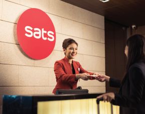 Front desk at SATS Premier Lounge - Terminal 2 (SIN).
