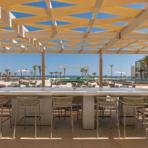 Outdoor bar area at Hilton Skanes Monastir Beach Resort.