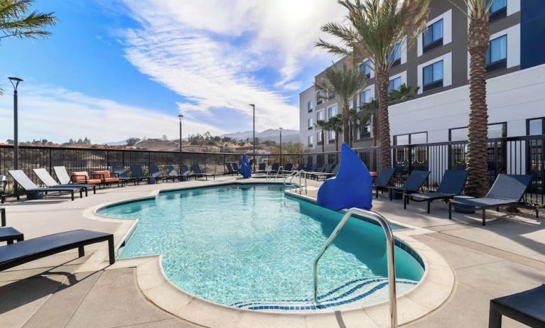 Outdoor pool area at Hampton Inn & Suites Corona, CA.