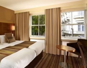 Day use twin room with work desk at Blakemore Hyde Park Hotel.