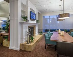 Lobby and coworking lounge at Hilton Garden Inn Macon / Mercer University.
