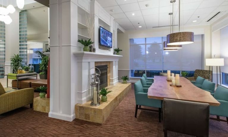 Lobby and coworking lounge at Hilton Garden Inn Macon / Mercer University.
