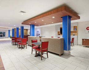 Dining area perfect for coworking at Holiday Inn Express & Suites Corona.