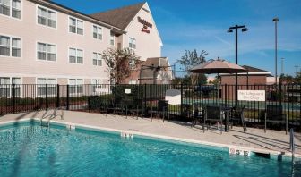 Refreshing outdoor pool at Residence Inn By Marriott Hattiesburg.