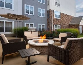 Firepit and outdoor furniture at Residence Inn By Marriott Bentonville Rogers.