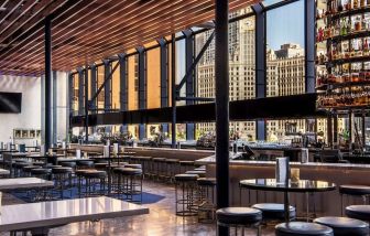 Hotel bar with natural light at Hyatt Regency Chicago.