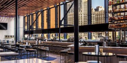 Hotel bar with natural light at Hyatt Regency Chicago.