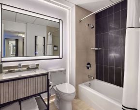 Guest bathroom with shower and tub at Hyatt Regency Chicago.