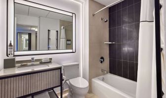 Guest bathroom with shower and tub at Hyatt Regency Chicago.