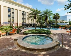 Hot tub beside the pool at Hampton Inn By Hilton Fort Lauderdale-Cypress Creek.