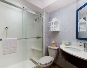 Guest bathroom with shower at Hampton Inn By Hilton Fort Lauderdale-Cypress Creek.