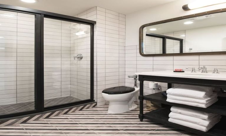 Guest bathroom with shower at The Chicago Hotel Collection River North.