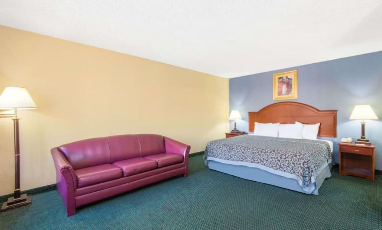 Spacious day use room with sofa at Blue Way Inn & Suites Wichita East.