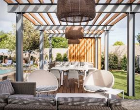 Cabanas beside the pool at Hotel Nia, Autograph Collection.