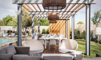 Cabanas beside the pool at Hotel Nia, Autograph Collection.