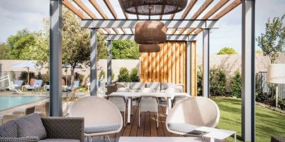 Cabanas beside the pool at Hotel Nia, Autograph Collection.