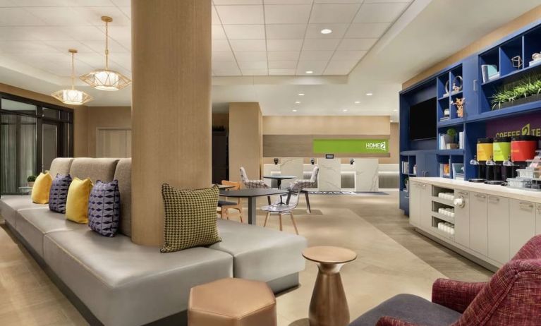 Lobby and coworking lounge at Home2 Suites By Hilton Chicago River North.
