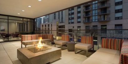 Firepit in the terrace of Home2 Suites By Hilton Chicago River North.
