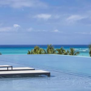 Refreshing infinity pool at Alohilani Resort Waikiki Beach.
