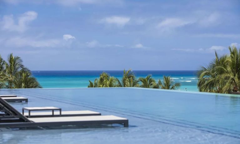 Refreshing infinity pool at Alohilani Resort Waikiki Beach.
