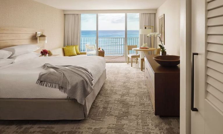 Day use room with balcony and ocean view at Alohilani Resort Waikiki Beach.