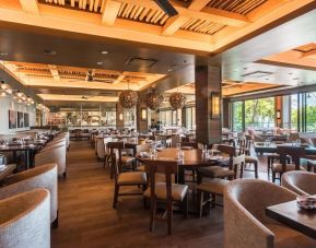 Dining area perfect for coworking at Alohilani Resort Waikiki Beach.